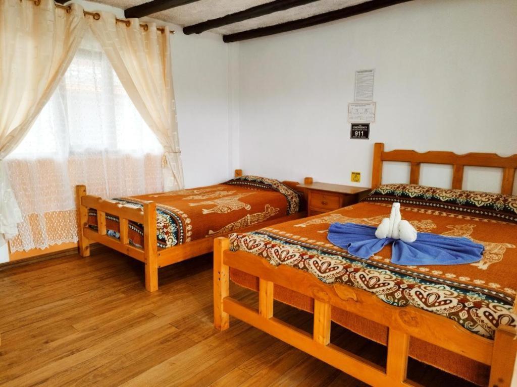 Hostal Taita Cristobal Isinlivi Exterior foto